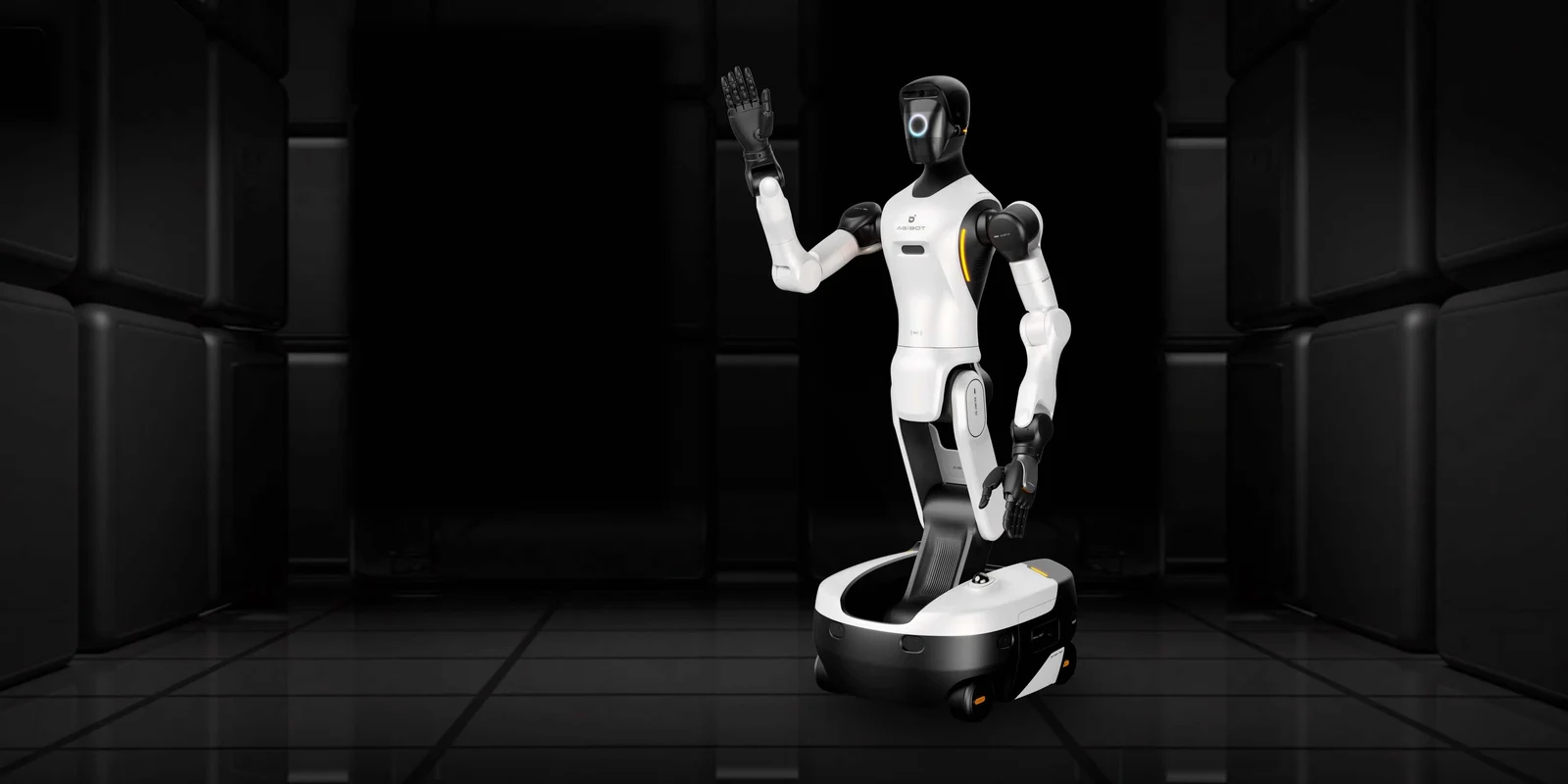 Wheeled humanoid waving in a dark industrial-looking environment.